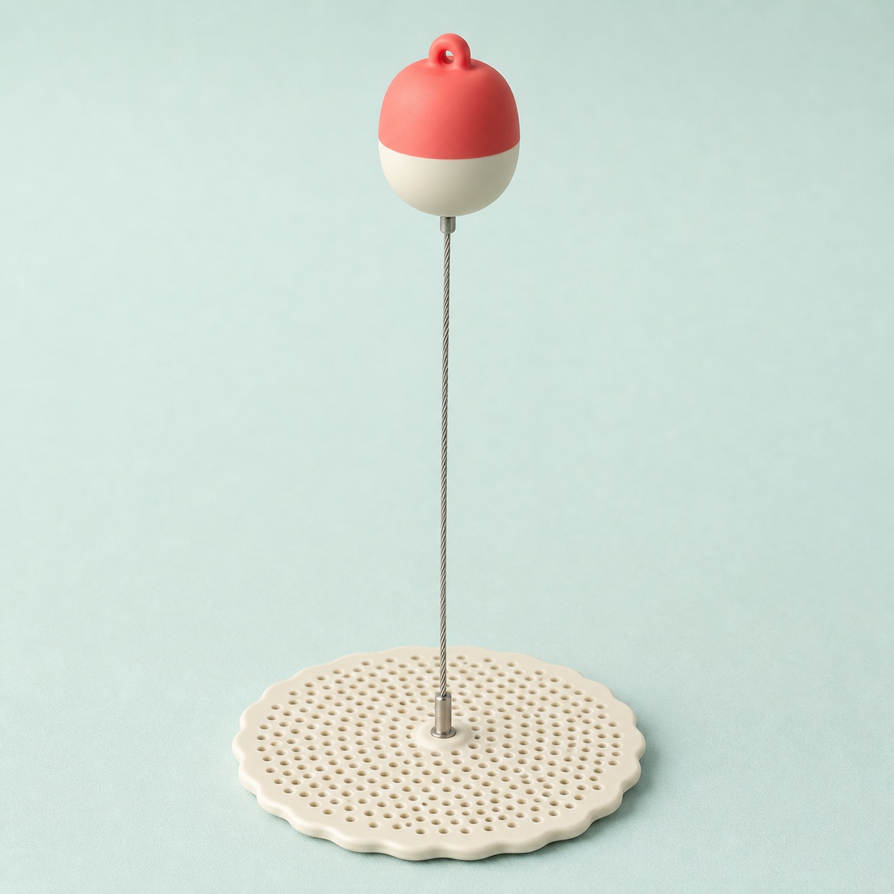 The Pickle Buoy concept showing a perforated platform, stainless tether and floating handle